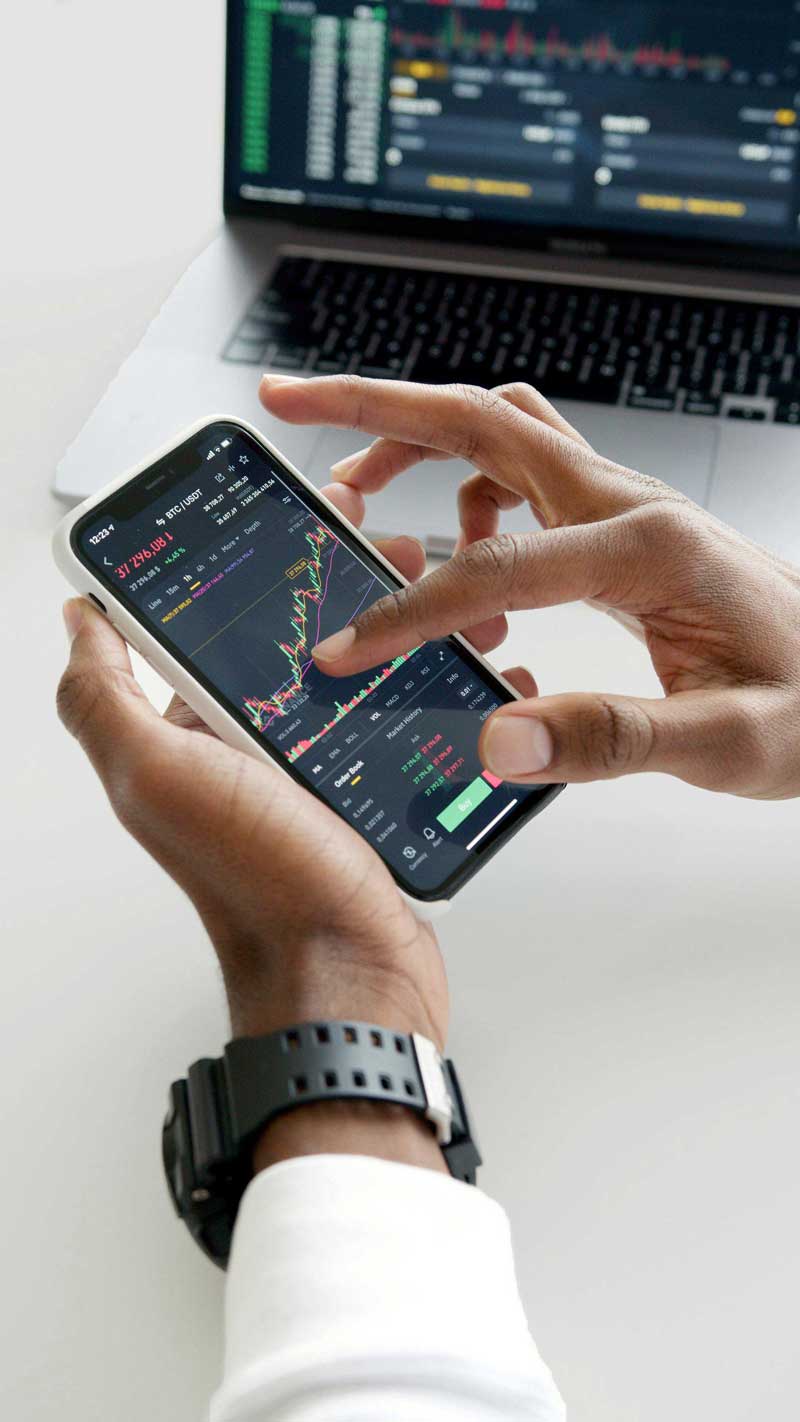 closeup of a person using a finace app on a smart phone