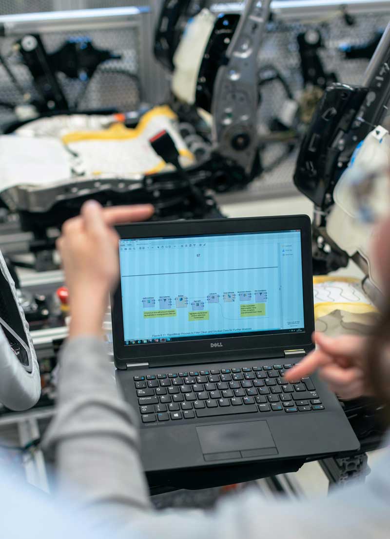 dated laptop running software in a manufacturing facility
